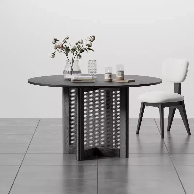 Tavolo da pranzo rotondo nero con gambe in rattan, 6 posti a sedere