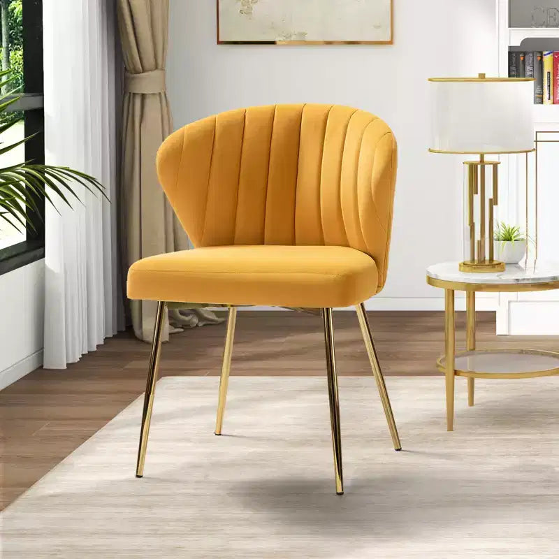 Poltrona d'accento trapuntata in velluto con gambe in metallo, multicolore, a sedile singolo